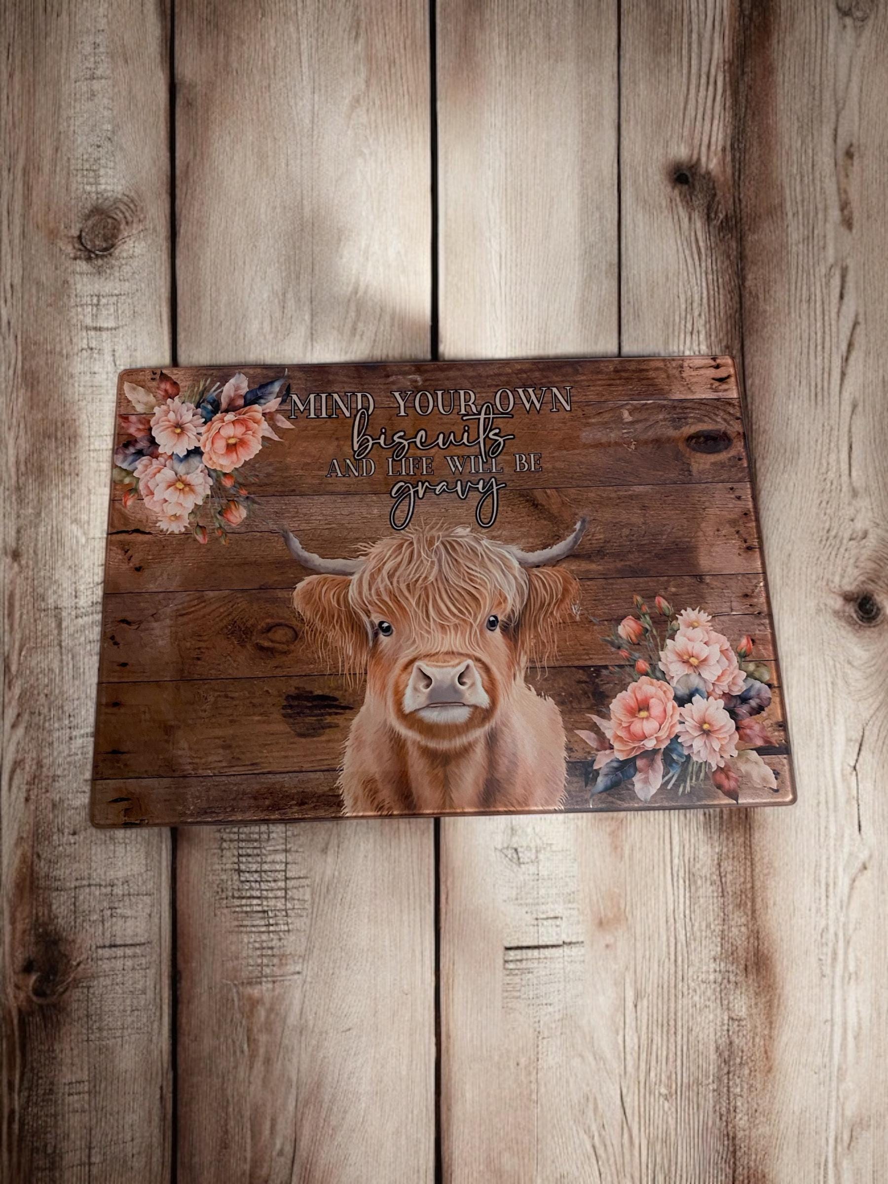 "Mind Your Biscuits" Highland Cow Glass Worktop Saver