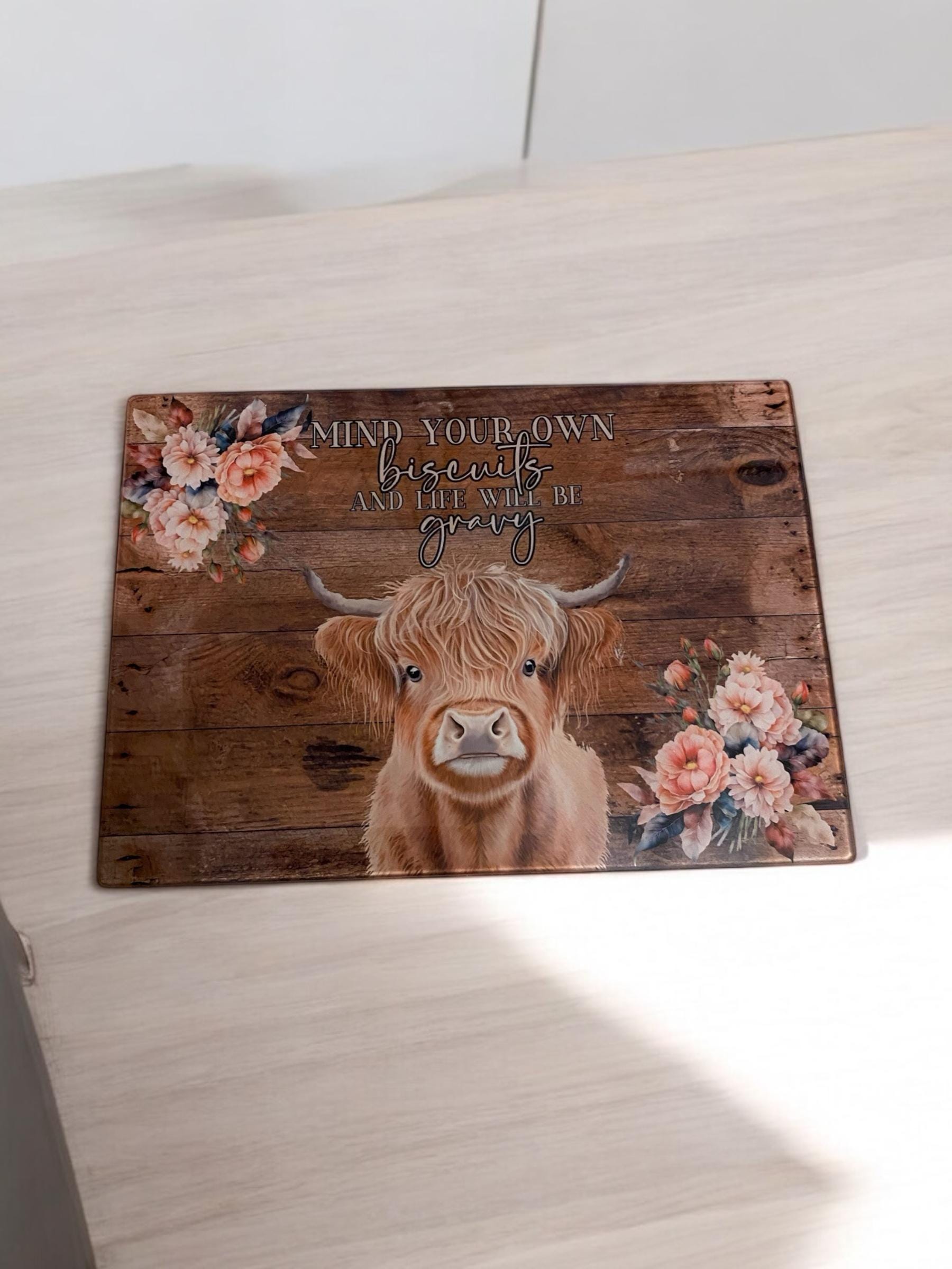"Mind Your Biscuits" Highland Cow Glass Worktop Saver